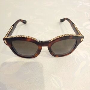 Elegant GIVENCHY Sunglasses with Gold Accents